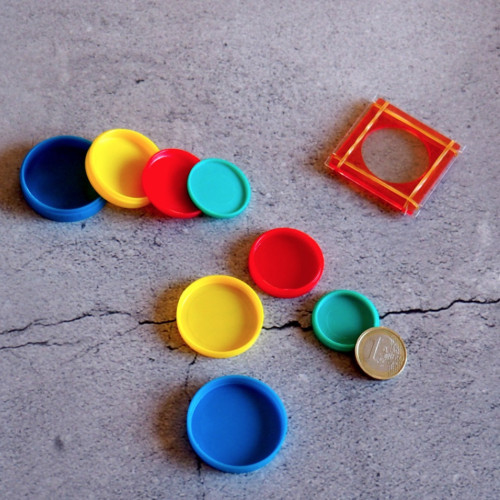 MONEDA EN LAS CAJAS - PLÁSTICO